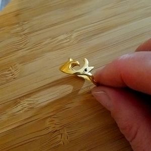 Gold plated ring with small garnet